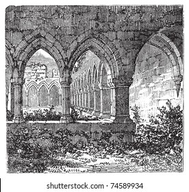 Gothic cloisters and arch at Kilconnel Abbey, in County Galway, Ireland. Old engraving. Old engraved illustration of gothic cloister.