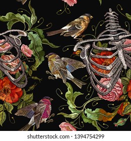 Gothic embroidery human rib cage with red roses and titmouse seamless pattern. Art template for clothes, textiles, t-shirt design 