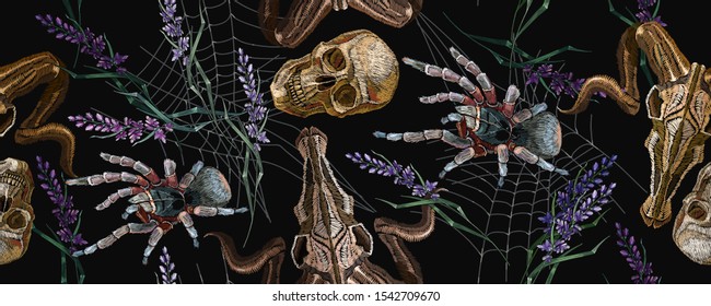 Gothic embroidery. Human skulls, lavender flowers, tarantula spider and bull head, clothes background. Horizontal seamless pattern. Halloween dark background. Fashionable template for clothes 