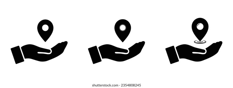 GPS location icon set in black color on hand. Location pin icon. Map pin place marker. Location icon hand. Map marker pointer icon set on palm. GPS location symbol collection on palm hand. Flat style.