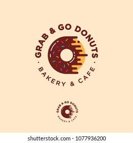 Grab and go Donuts logo. Bakery and donuts cafe emblem. Chocolate Donut with small candies.  Japanese style. Identity. Monochrome option.