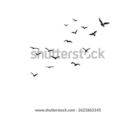 A graceful bird soaring high in the sky, wings spread wide, gliding effortlessly through the clouds.
