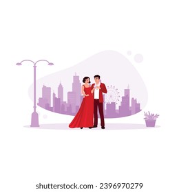 Graceful and elegant young couple holding wine glasses in their hands. Standing against the backdrop of urban views. Relationship concept. Trend Modern vector flat illustration