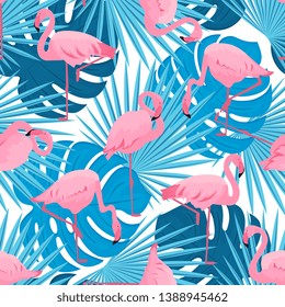 Graceful flamingos and monstera and palm leaves. Tropical summer seamless pattern.