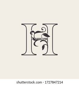 Graceful Floral Letter H Luxury Logo Icon . Outline simple beautiful logo. Vintage drawn alphabet in art nature leaf style.