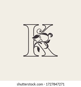 Graceful Floral Letter K Luxury Logo Icon . Outline simple beautiful logo. Vintage drawn alphabet in art nature leaf style.