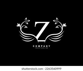 Graceful monograma de diseño. el logograma de las bellas alas. Letra blanca tipografía con emblema Z con alas florecientes para regalías, tarjeta de visita, Boutique, Hotel, Restaurante, Joyería, negocios, empresa