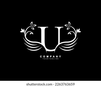 Graceful monogram design element. pretty wings logogram. White letter U emblem typography with flourish wings for Royalty, business card, Boutique, Hotel, Restaurant, Jewellery, business, company