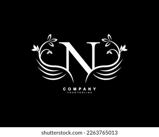 Graceful monogram design element. pretty wings logogram. White letter N emblem typography with flourish wings for Royalty, business card, Boutique, Hotel, Restaurant, Jewellery, business, company