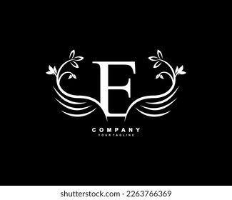 Graceful monogram design element. pretty wings logogram. White letter E emblem typography with flourish wings for Royalty, business card, Boutique, Hotel, Restaurant, Jewellery, business, company