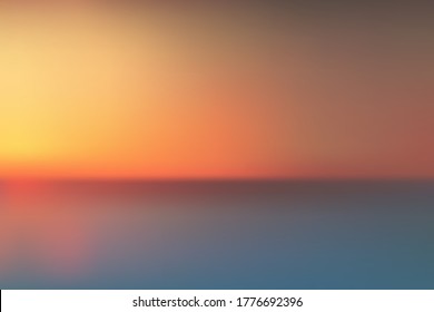 Gradient abstract wallpaper consisting of yellow and red to black that look like the sky on a rising sun lake which can be used as a backdrop.