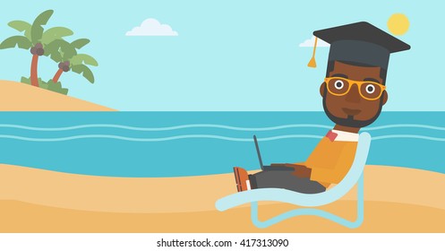 Graduate lying on chaise lounge with laptop.
