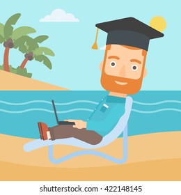 Graduate lying on chaise lounge with laptop.