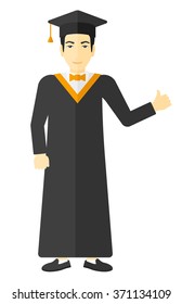 Graduate showing thumb up sign.