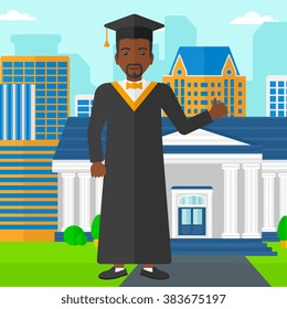 Graduate showing thumb up sign.