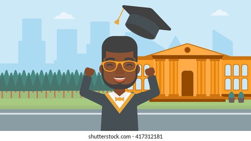 Graduate throwing up his hat.