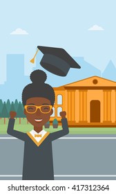 Graduate wirft seinen Hut auf.