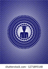 graduated icon inside badge with denim background