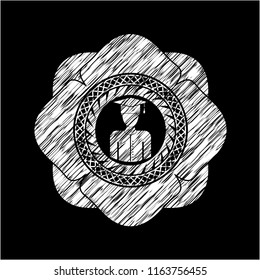 graduated icon inside chalkboard emblem written on a blackboard