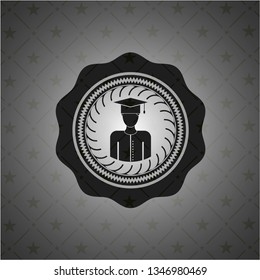 graduated icon inside dark emblem