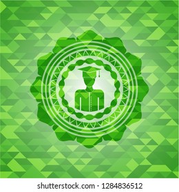 graduated icon inside green mosaic emblem