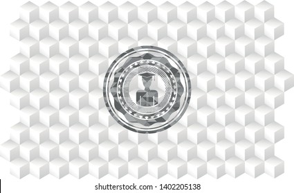 graduated icon inside grey badge with geometric cube white background