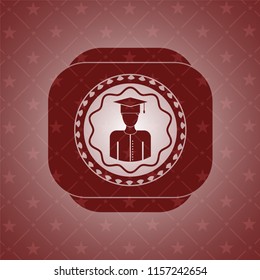 graduated icon inside red emblem