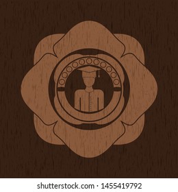 graduated icon inside retro style wooden emblem