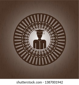 graduated icon inside vintage wood emblem