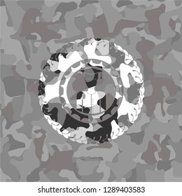 graduated icon on grey camo pattern