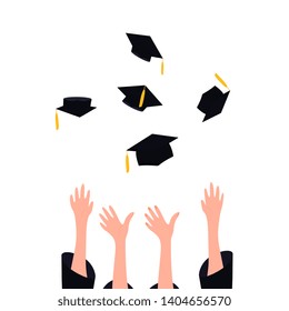 Graduates throwing graduation hats with tassel in the air. University ceremony concept.