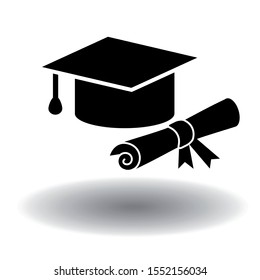Graduation black vector icon. Flat solid illustration of mortarboard cap or graduation hat with rolled diploma isolated on white backfround. Design for apps and websites