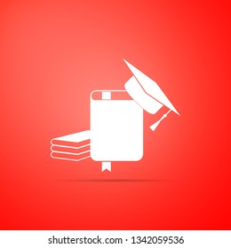 Graduation cap and book icon isolated on red background. Flat design. Vector Illustration