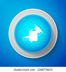 Graduation cap and book icon isolated on blue background. Circle blue button. Vector Illustration