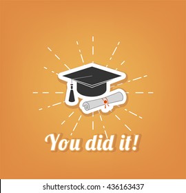 Graduation cap and diploma scroll 