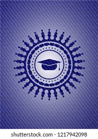 graduation cap icon inside badge with denim texture
