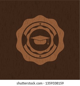 graduation cap icon inside badge with wooden background