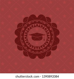 graduation cap icon inside badge with red background