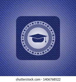 graduation cap icon inside badge with denim texture