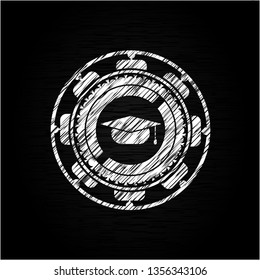 graduation cap icon inside chalkboard emblem on black board