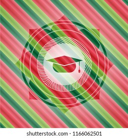 graduation cap icon inside christmas colors emblem.