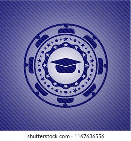 graduation cap icon inside emblem with denim high quality background