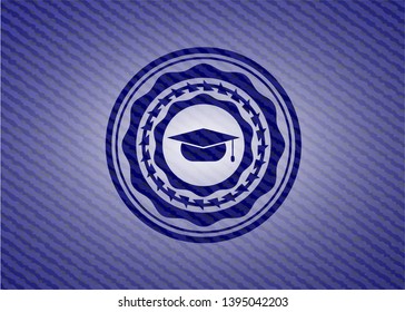 graduation cap icon inside emblem with denim texture