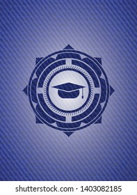 graduation cap icon inside emblem with denim high quality background