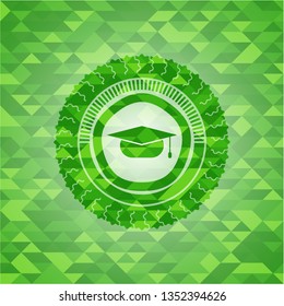 graduation cap icon inside green emblem with mosaic background