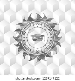 graduation cap icon inside grey icon or emblem with geometric cube white background