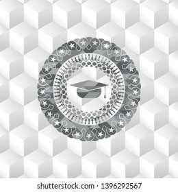 graduation cap icon inside grey emblem with geometric cube white background