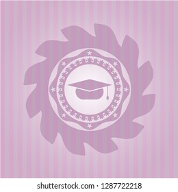 graduation cap icon inside pink emblem
