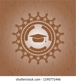 graduation cap icon inside realistic wooden emblem