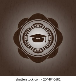 graduation cap icon inside realistic wood emblem. 